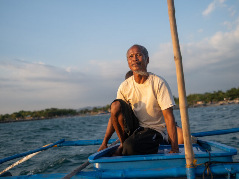 George Cacayuran sails around the municipal fishing grounds to catch squid in Agoo, La Union.