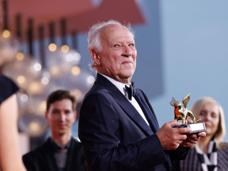 Werner Herzog poses with the Golden Lion at the The 82nd Venice International Film Festival on August 27, 2025 Venice, Italy.