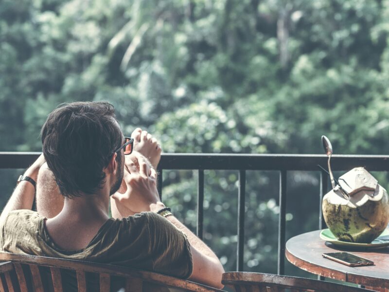 Man relaxing on a balcony