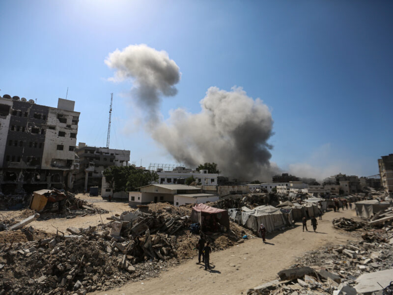 Smoke rises from Al-Ghafri Tower in Gaza City, after it was hit by an Israeli air strike on September 15, 2025