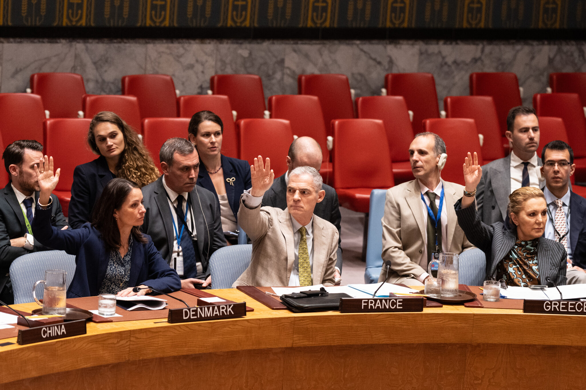 Representatives of Denmark, France and Greece vote at UN headquarters in New York, NY on September 19, 2025.