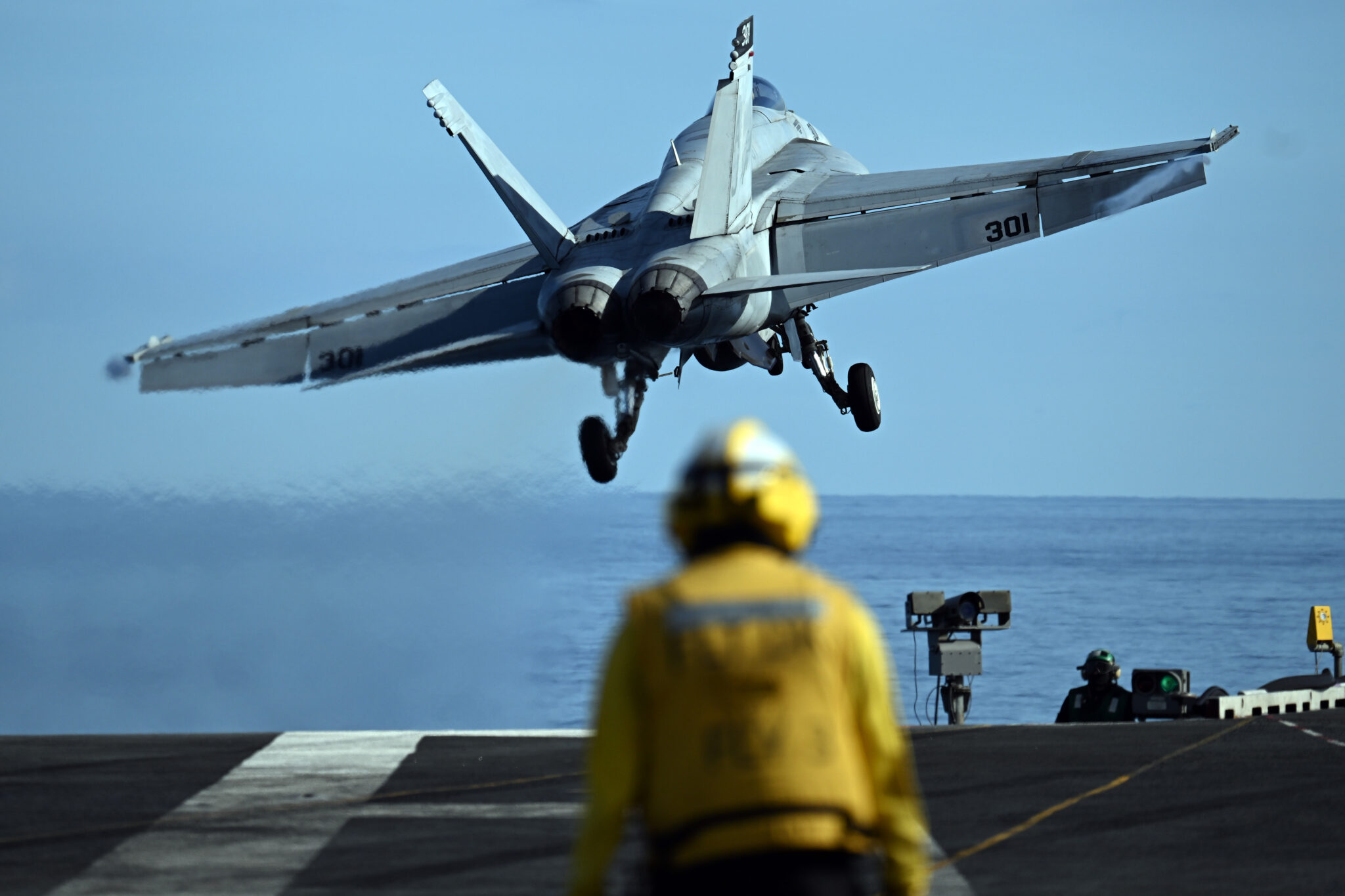 An F 18 fighter jet takes off from the USS Gerald R. Ford aircraft carrier.