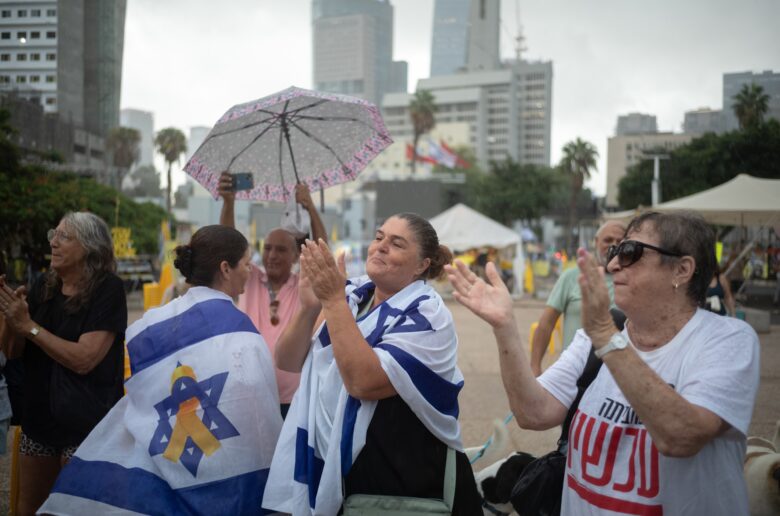 People gather at hostage square in Tel Aviv to celebrate the ceasefire deal in Tel Aviv, Israel on 09 October 2025.