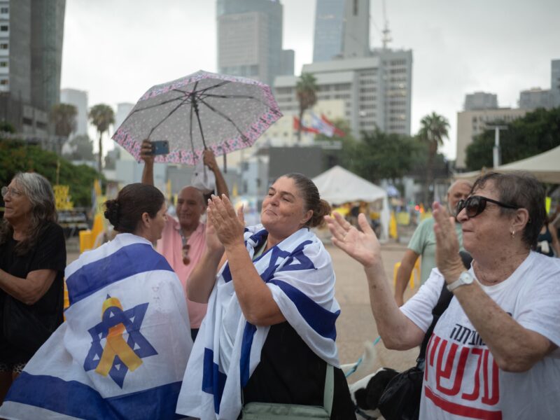 People gather at hostage square in Tel Aviv to celebrate the ceasefire deal in Tel Aviv, Israel on 09 October 2025.