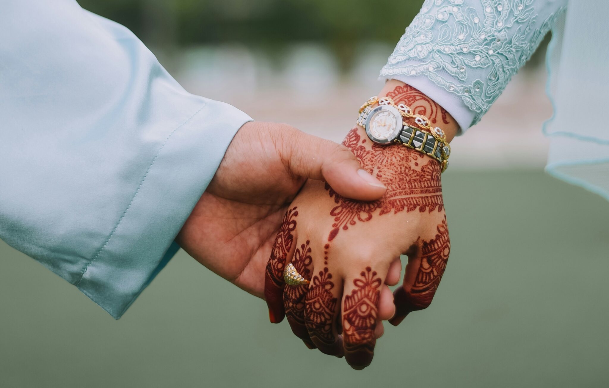 Couple holding hands