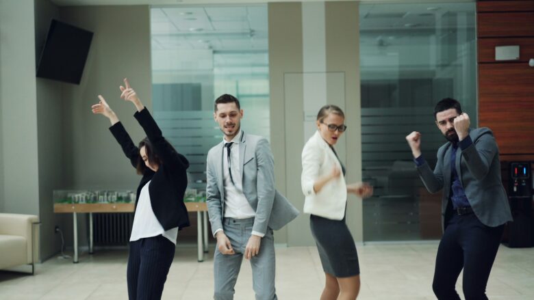 Business people dancing.