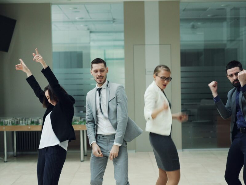 Business people dancing.