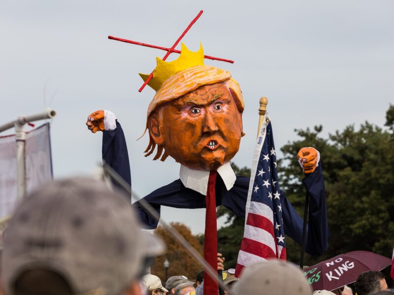 Protesters hold an effigy of US President Donald Trump as part of the No Kings Day protests on October 18, 2025, in Washington, USA.
