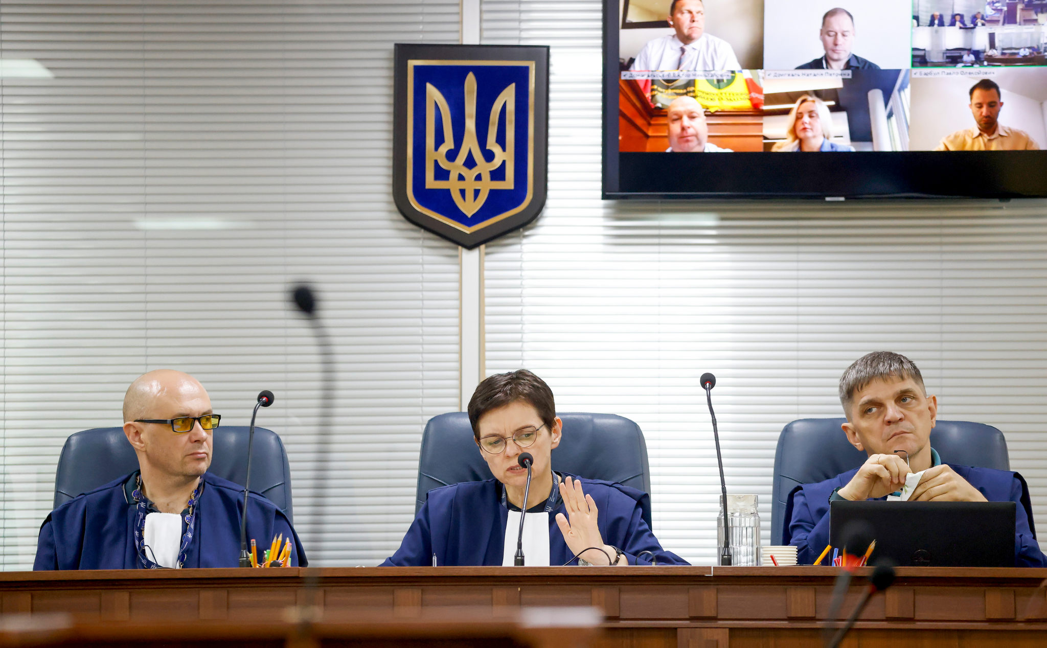 High Anti-Corruption Court judges attend a hearing in the corruption case involving SpetsTechnoExport in Kyiv, with accused Pavlo Barbul appearing remotely.