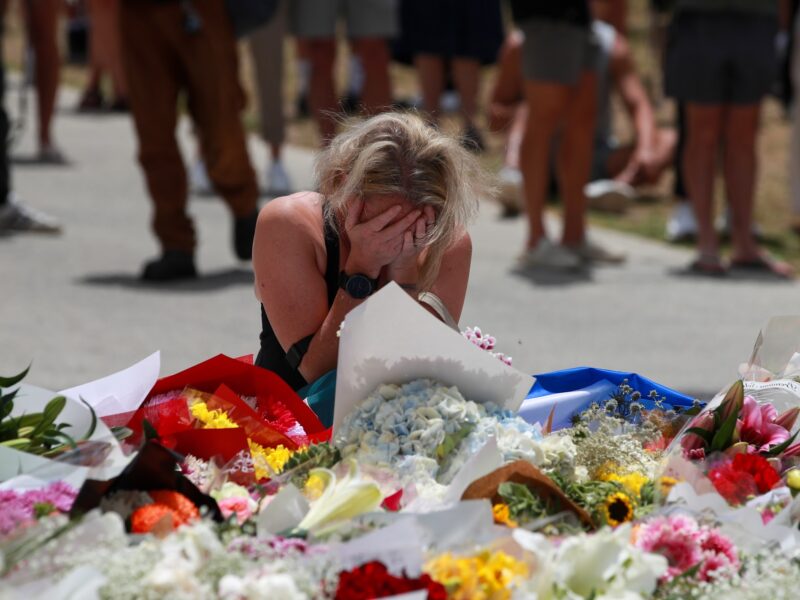 A woman mourns the victims of the Bondi Beach shooting in Sydney, Australia, Dec. 15, 2025.