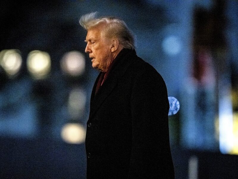 Donald Trump walks on the South Lawn of the White House, Tuesday, December 9, 2025.