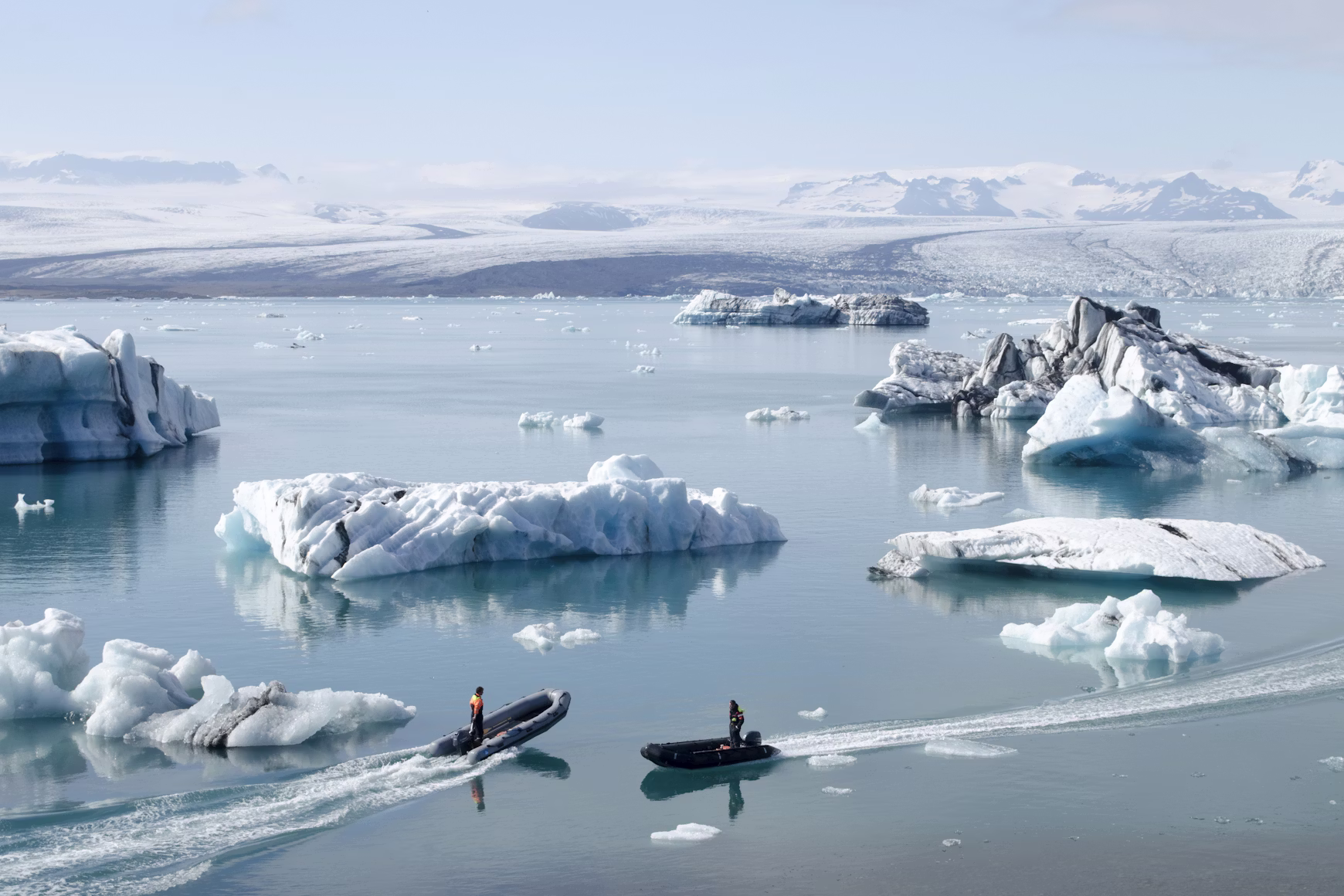 Boats passing off the coast of Iceland.