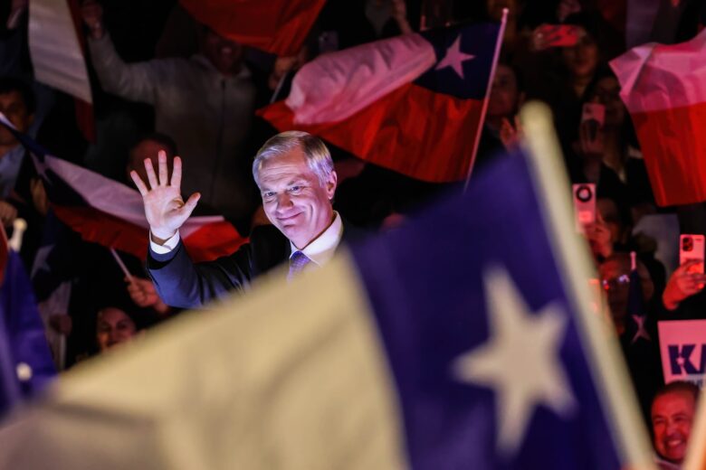 Jose Antonio Kast enters to deliver his speech to hundreds of supporters in the city of Villa Alemana, Chile.
