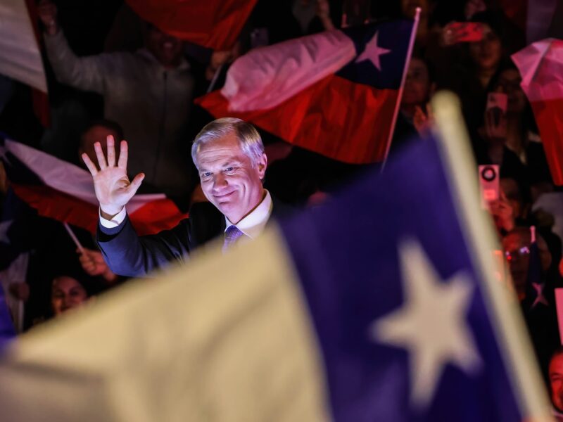 Jose Antonio Kast enters to deliver his speech to hundreds of supporters in the city of Villa Alemana, Chile.