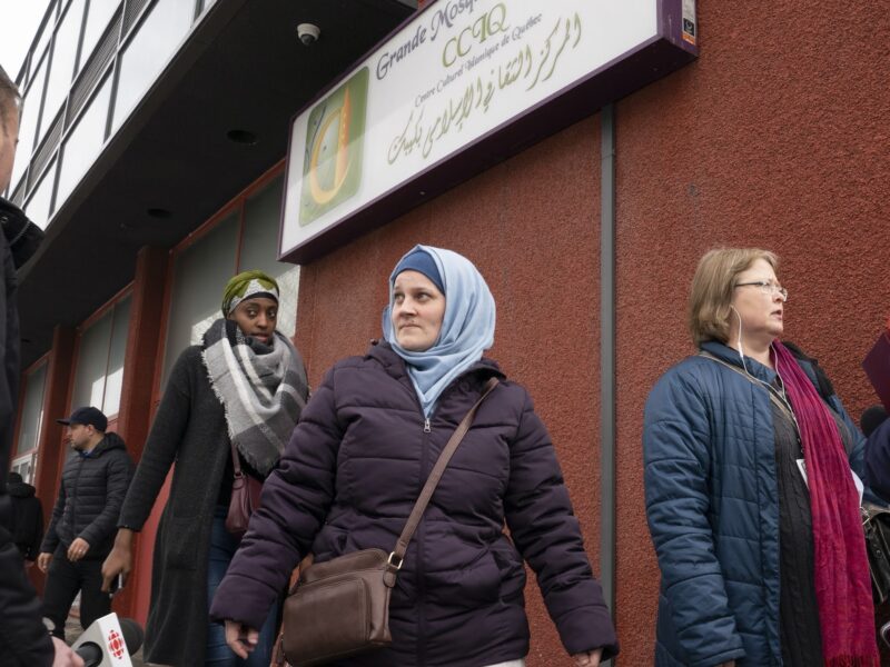 Worshippers walk out of the Quebec Islamic cultural centre after the noon prayer, Friday, in Quebec City.