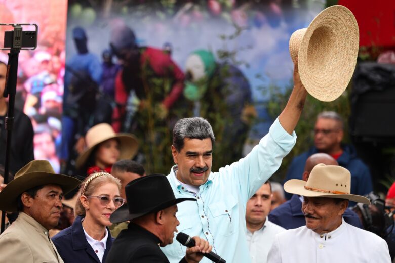 Venezuelan President Nicolas Maduro attends a rally on the day Venezuelan opposition leader Machado was honored with the Nobel Peace Prize. 10 December 2025, Venezuela, Caracas